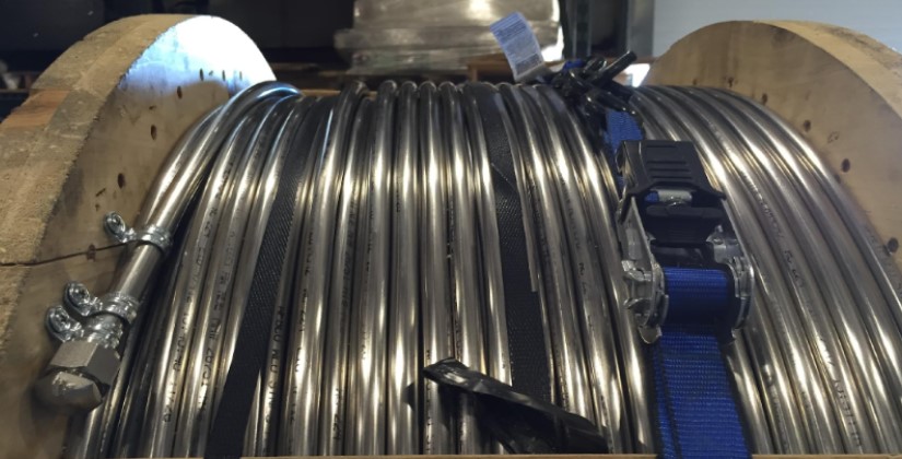 457m of beadedstream digital temperature cables inside stainless steel conduit on custom reels